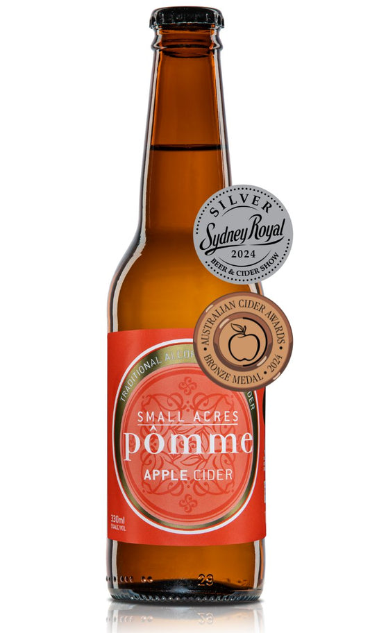 330ml bottle of Pomme Apple Cider with a Silver Medal from Sydney Royal 2024 and a bronze award from Australian Cider Awards 2024